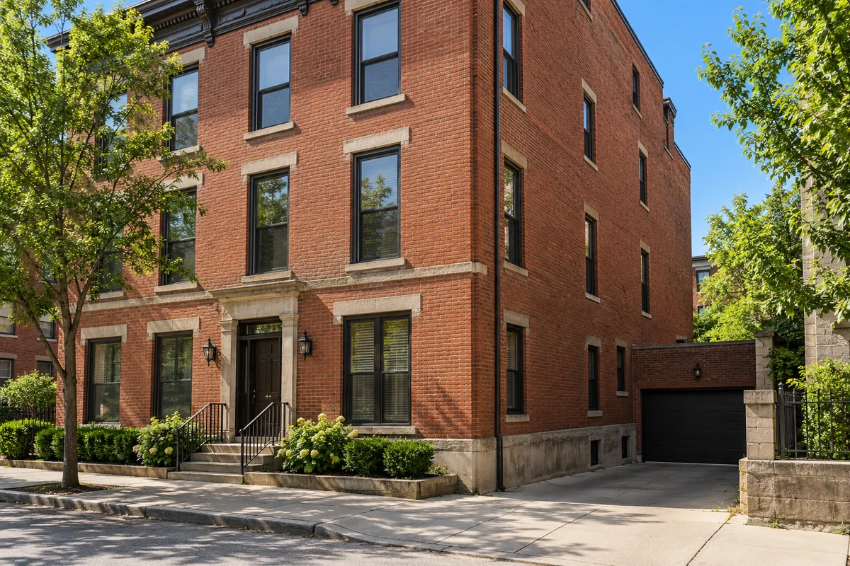 Representative Ohio urban brick corner with a recessed garage entrance.